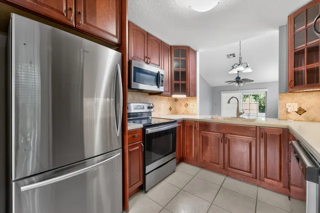 $449,000 | 13164 Quiet Woods Road, Unit B, Wellington, FL 33414