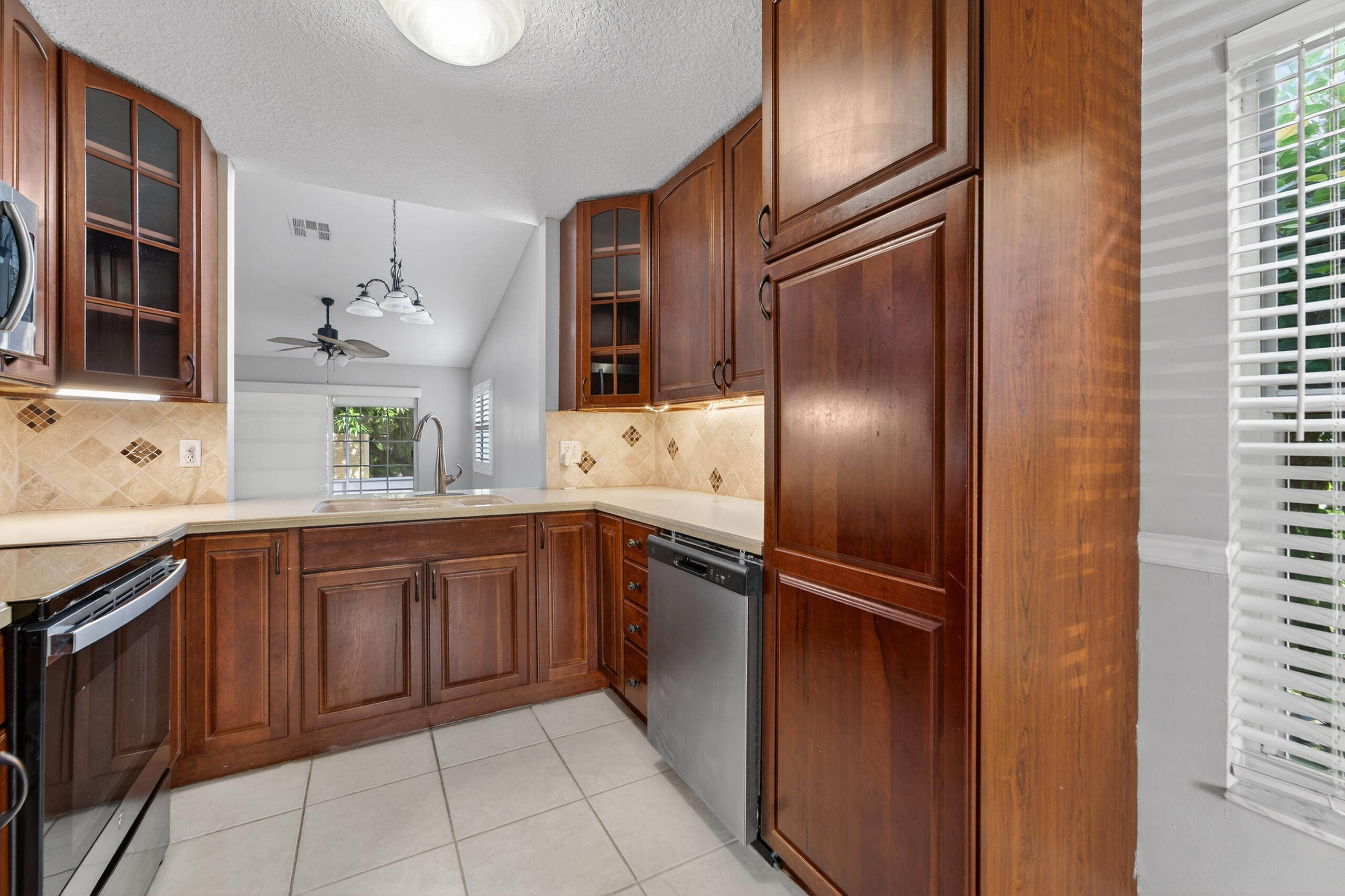 13164 Quiet Woods Road, Unit B Wellington, FL 33414 - Photo 7 of 48 Large pantry cabinet
