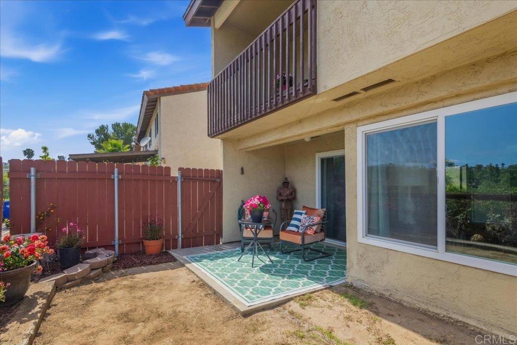 3047 Highlands Boulevard Spring Valley, CA 91977 - Photo 17 of 39 a view of a porch with a table and chairs