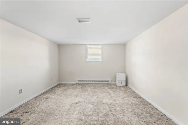 an empty room with a window