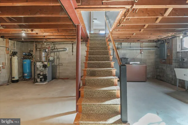 a room with a table and chairs