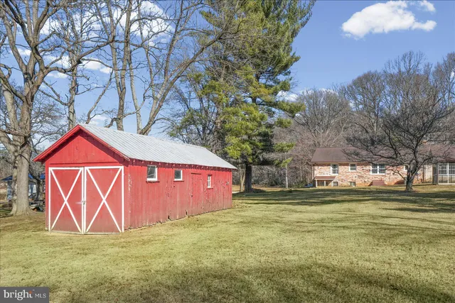 a street sign that is sitting in the grass
