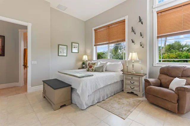 a bathroom with a shower and mirror