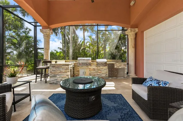 a view of a patio with couches chairs dining table and chairs