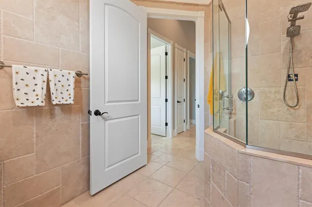 a kitchen with a sink a stove and cabinets