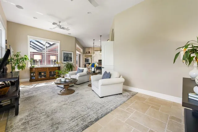 a view of swimming pool with seating space