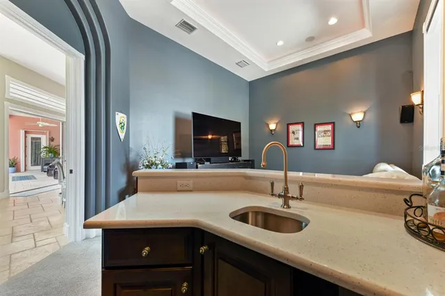 a view of a house with a yard and plants