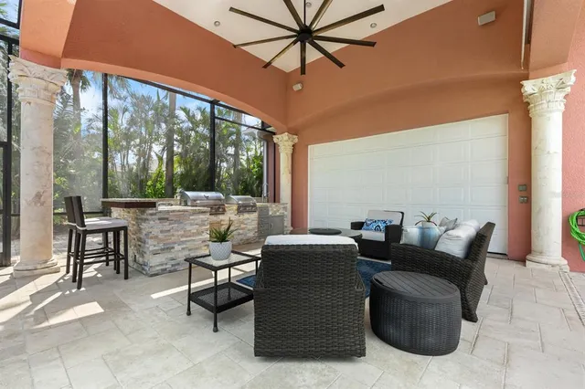a view of a swimming pool with a patio