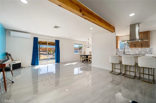 a lobby with furniture and rug