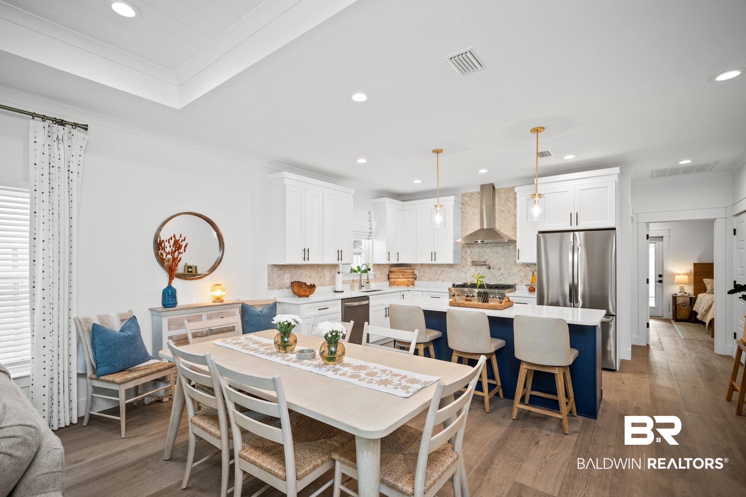 5501 Mobile Avenue Orange Beach, AL 36561 - Photo 5 of 40 Dining room with recessed lighting, wood finished floors, and ornamental molding