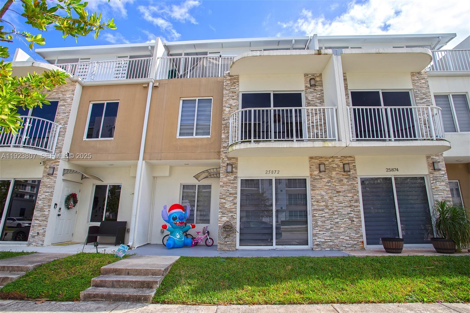 25872 Southwest 139th Path Homestead, FL 33032 - Photo 1 of 51 a front view of house with yard