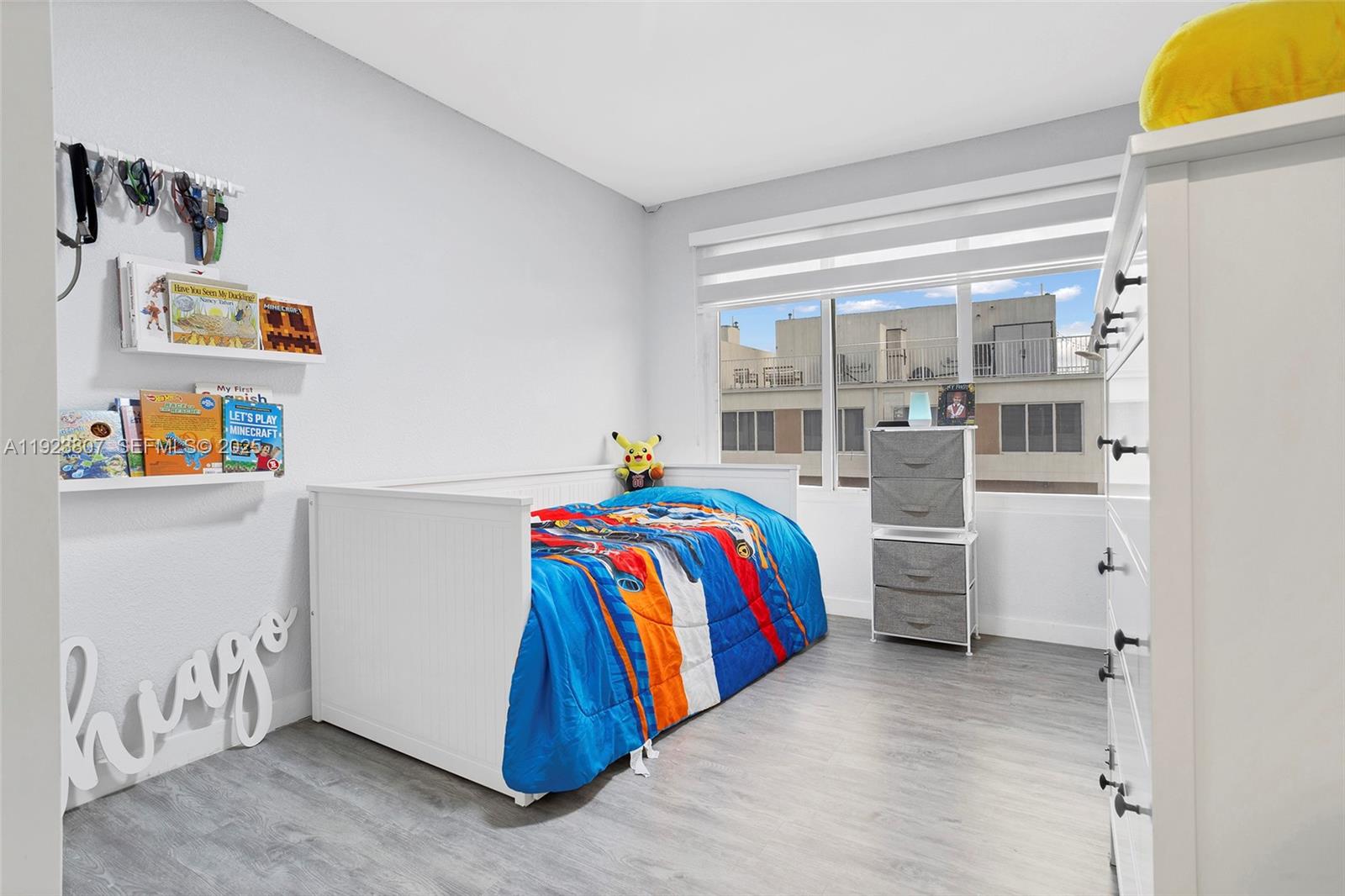 25872 Southwest 139th Path Homestead, FL 33032 - Photo 25 of 51 a bedroom with a bed and a window