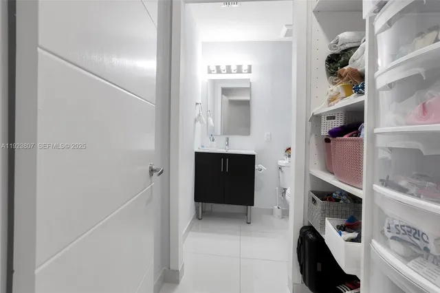 a en suite bathroom with a sink a toilet and shower