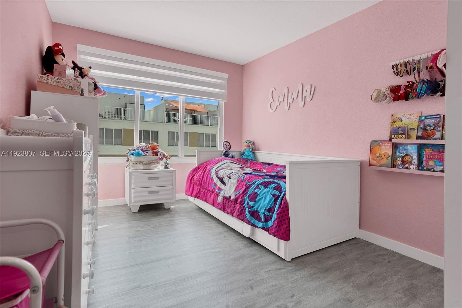 25872 Southwest 139th Path Homestead, FL 33032 - Photo 30 of 51 a bedroom with furniture and a large window