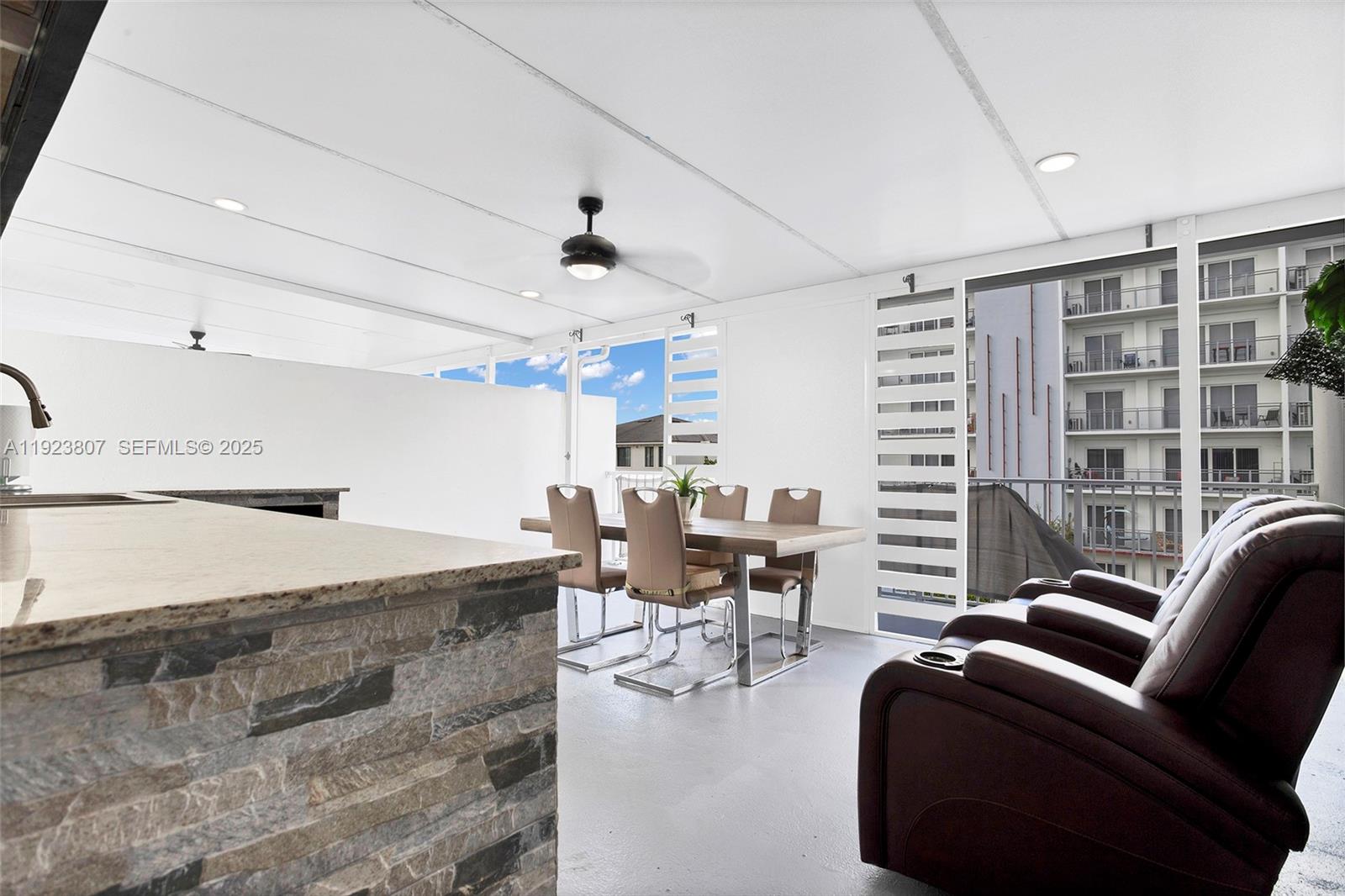 25872 Southwest 139th Path Homestead, FL 33032 - Photo 38 of 51 a living room with furniture and a large window