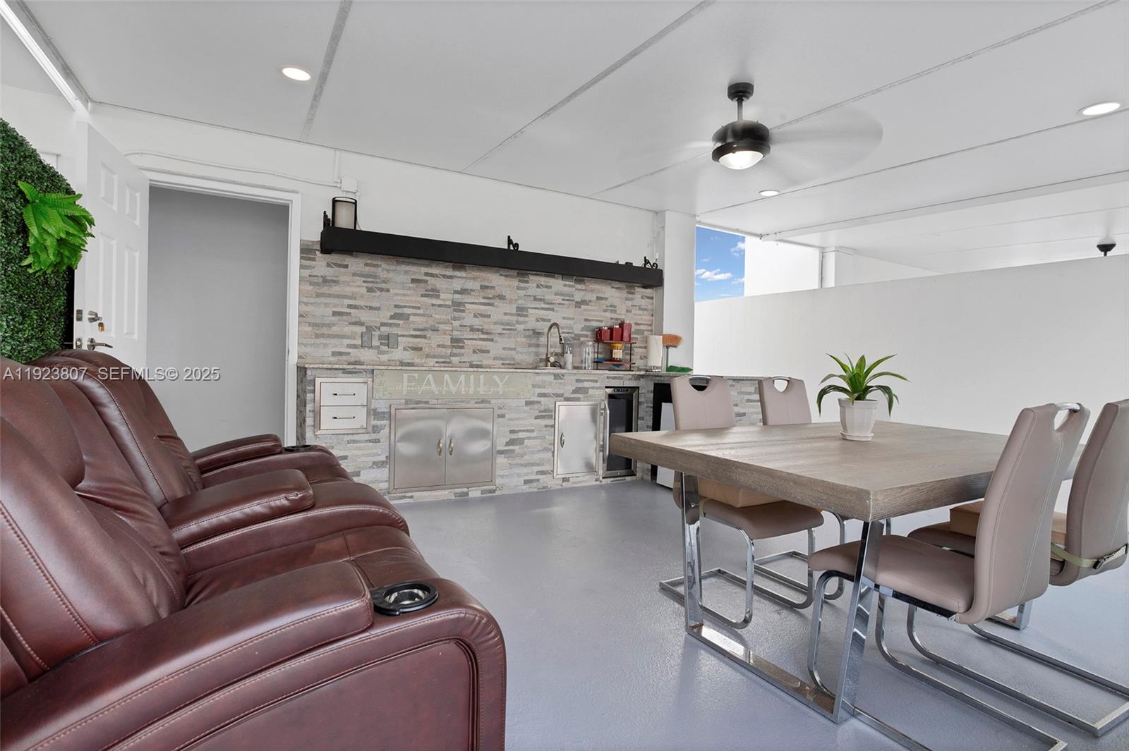25872 Southwest 139th Path Homestead, FL 33032 - Photo 40 of 51 a living room with furniture and a table