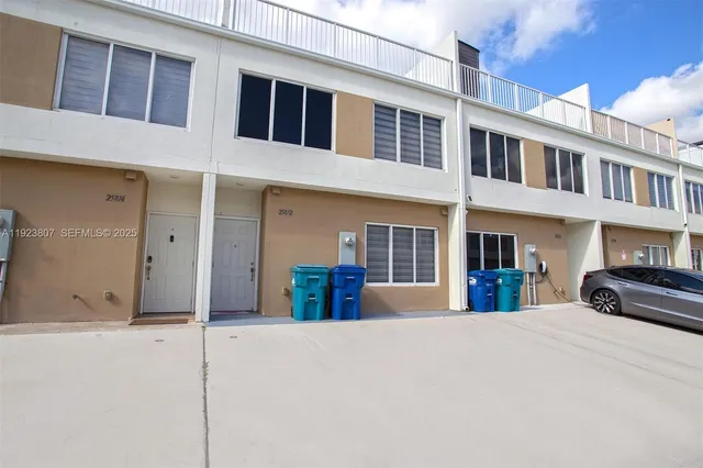a view of a building with large windows and a large window