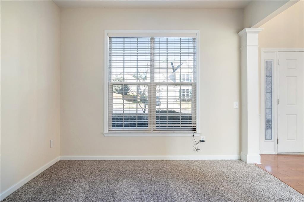 2300 Coltsgate Road Waxhaw, NC 28173 - Photo 11 of 21 a view of an empty room with a window