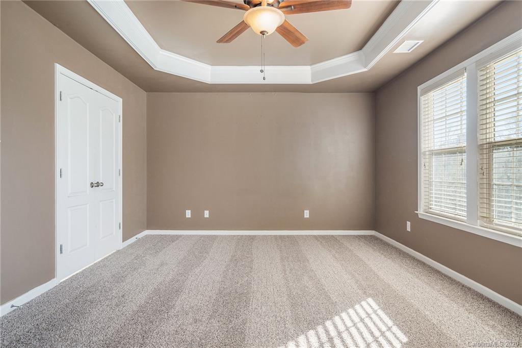 2300 Coltsgate Road Waxhaw, NC 28173 - Photo 13 of 21 a view of an empty room with a window