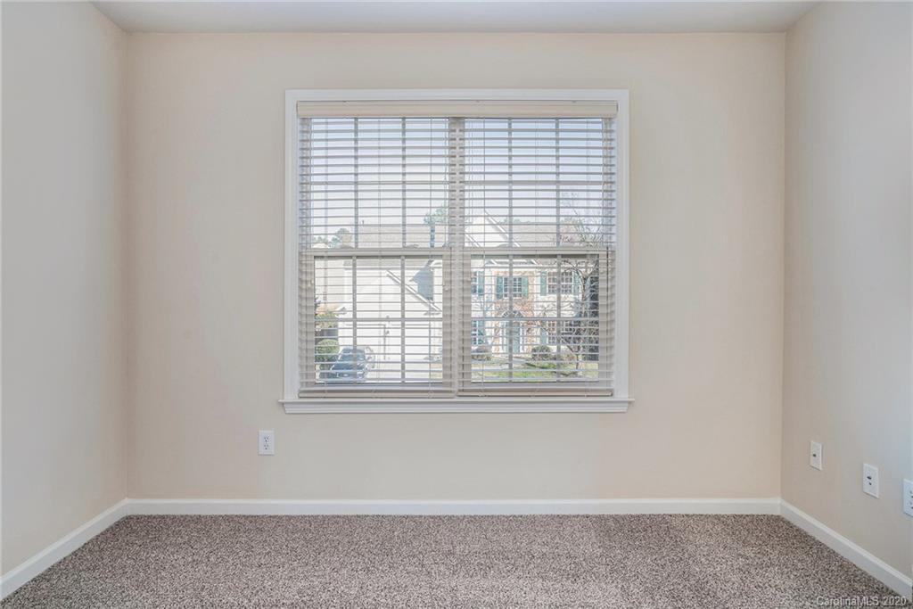 2300 Coltsgate Road Waxhaw, NC 28173 - Photo 16 of 21 a view of an empty room with a window