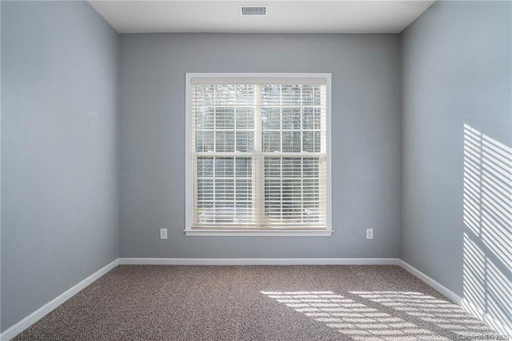 2300 Coltsgate Road Waxhaw, NC 28173 - Photo 19 of 21 a view of an empty room with a window