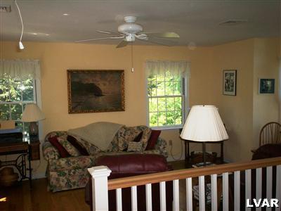 4670 McDermott Road Bangor, PA 18013 - Photo 6 of 10 a living room with furniture and a lamp