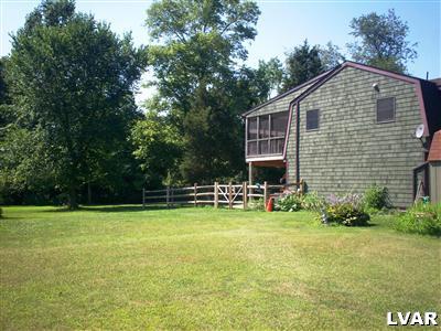 4670 McDermott Road Bangor, PA 18013 - Photo 8 of 10 a front view of a house with swimming pool having outdoor seating