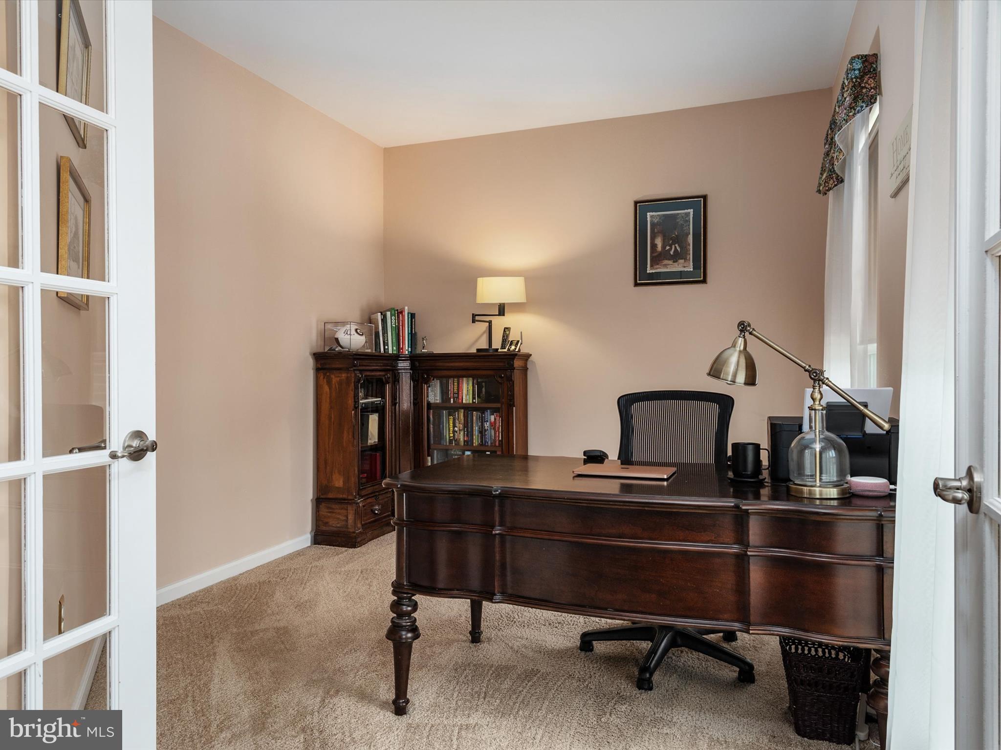 10402 Windlass Run Road Baltimore, MD 21220 - Photo 16 of 72 a view of a workspace with furniture
