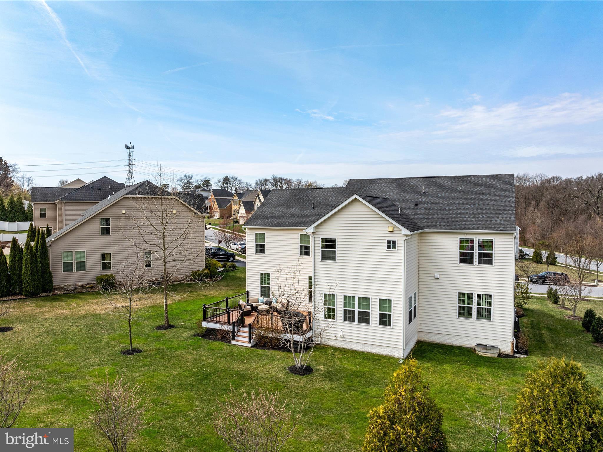 10402 Windlass Run Road Baltimore, MD 21220 - Photo 63 of 72 a view of a house with a yard and sitting area