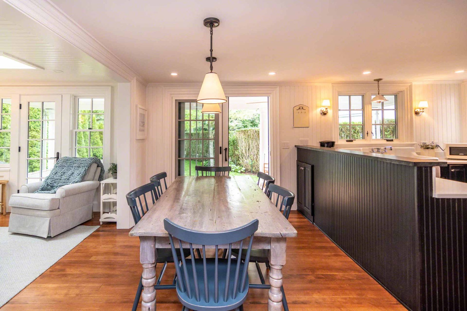 16 Mill Street Edgartown, MA 02539 - Photo 14 of 42 a view of a dining room with furniture window and wooden floor