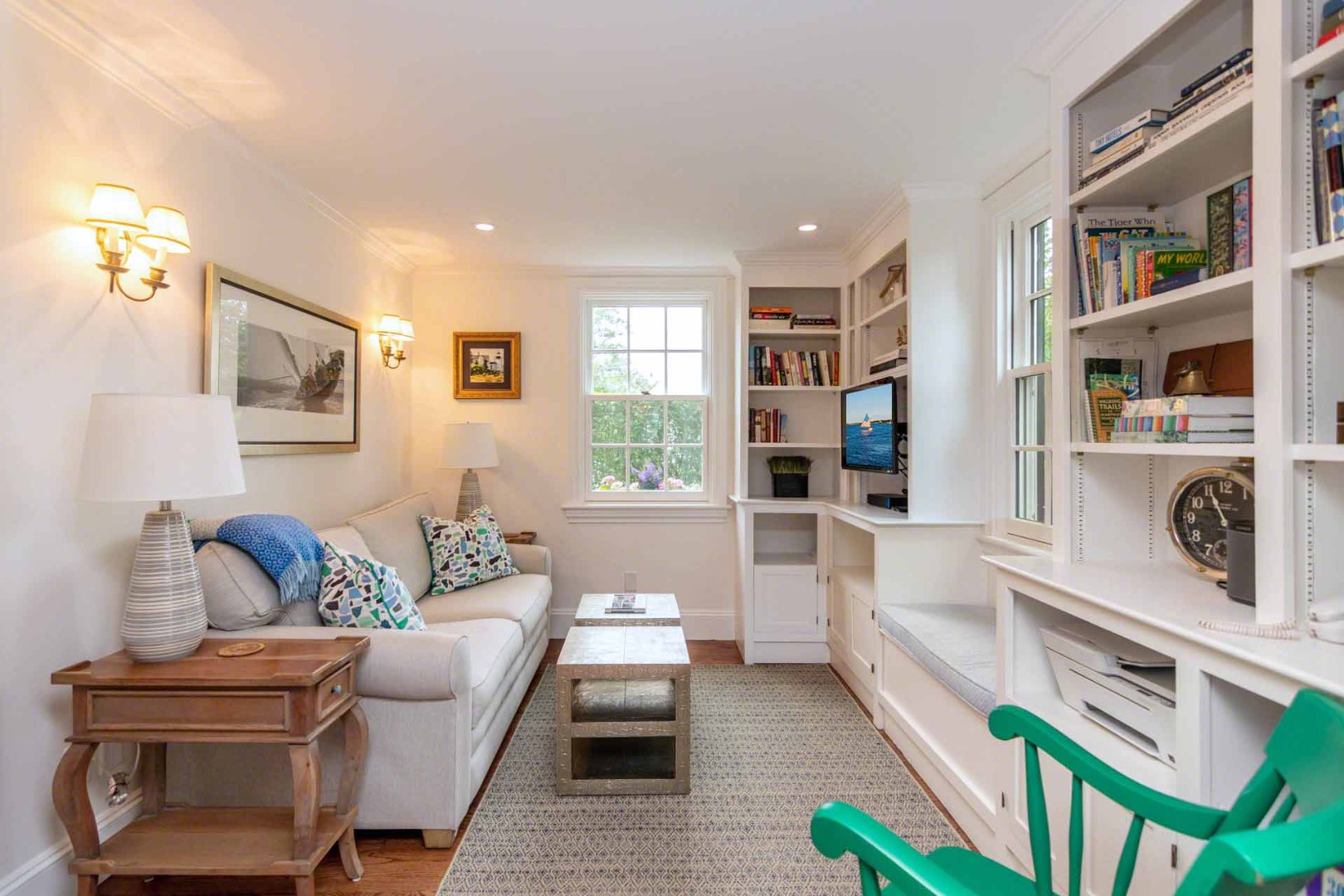 16 Mill Street Edgartown, MA 02539 - Photo 20 of 42 a living room with furniture and a book shelf