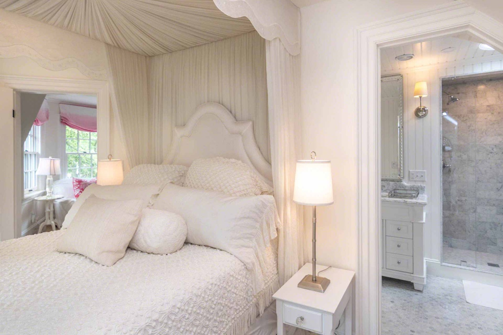 16 Mill Street Edgartown, MA 02539 - Photo 29 of 42 a bedroom with a bed and a table