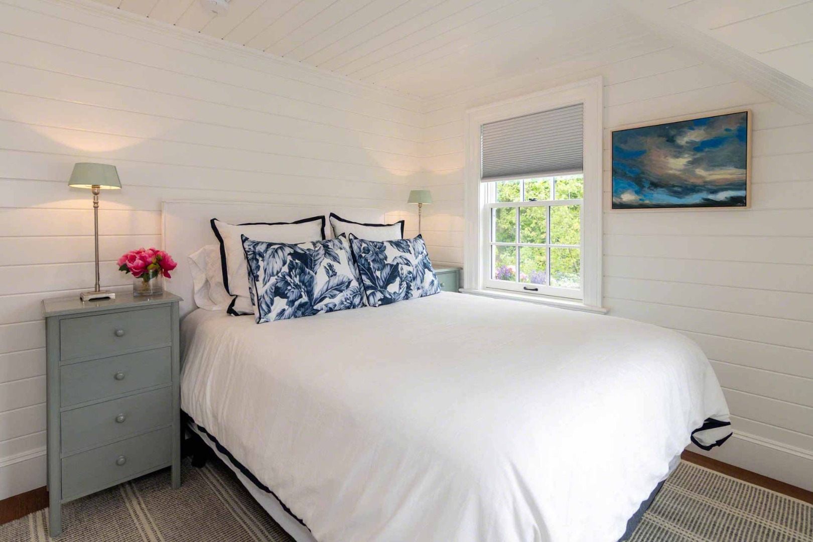 16 Mill Street Edgartown, MA 02539 - Photo 34 of 42 a bedroom with a bed and a window