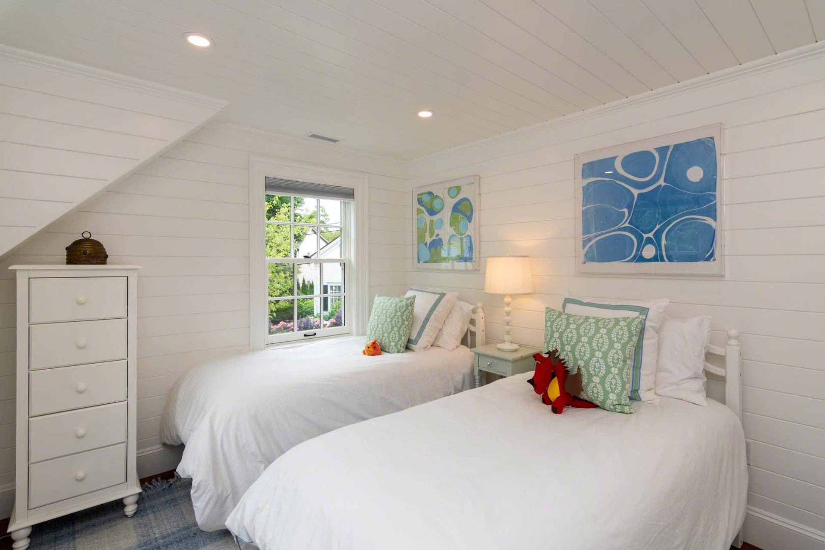 16 Mill Street Edgartown, MA 02539 - Photo 36 of 42 a bedroom with a bed and a window