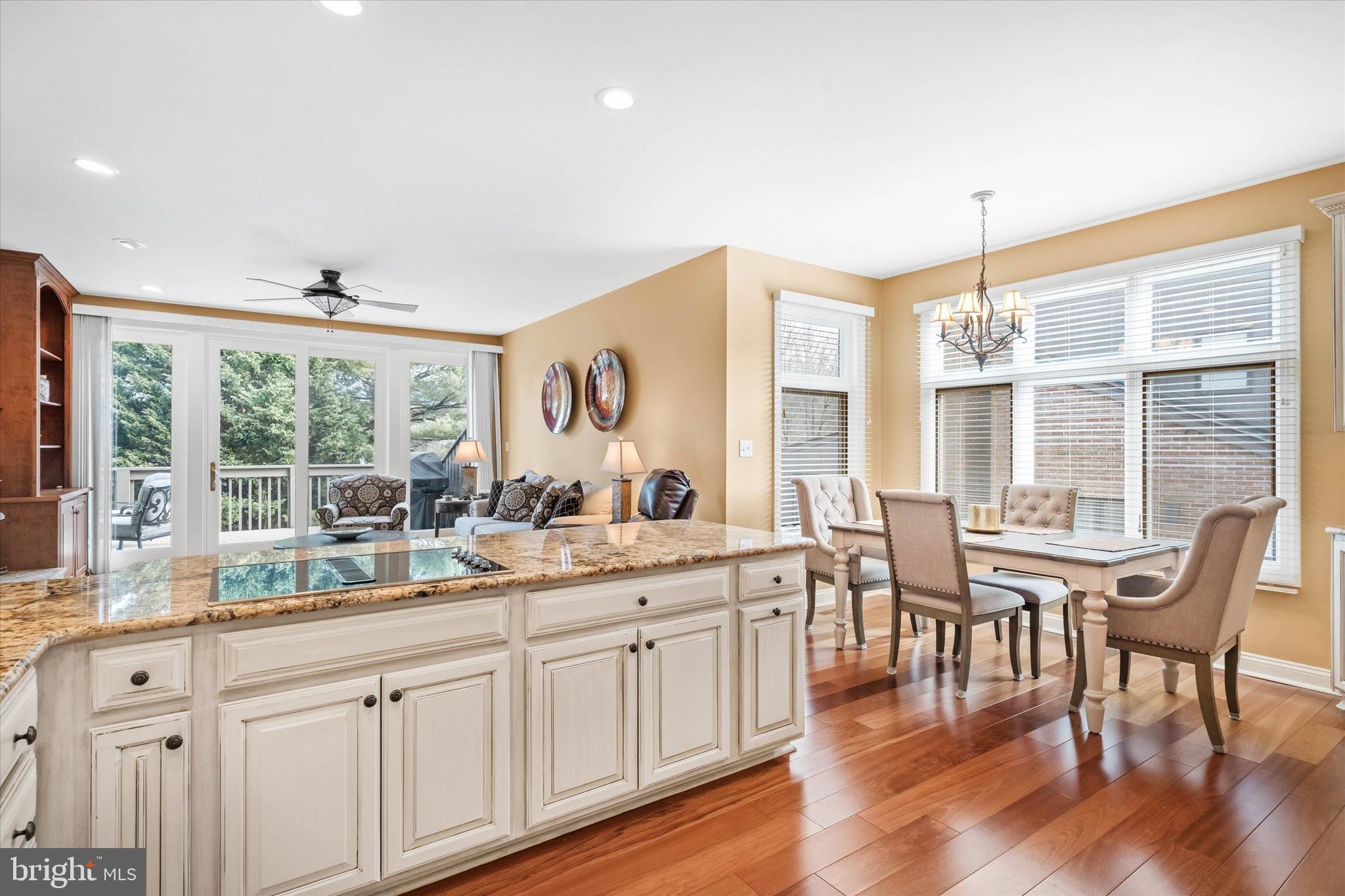 103 Downs Drive Wilmington, DE 19807 - Photo 20 of 70 a very nice looking dining room with a large window and wooden floors