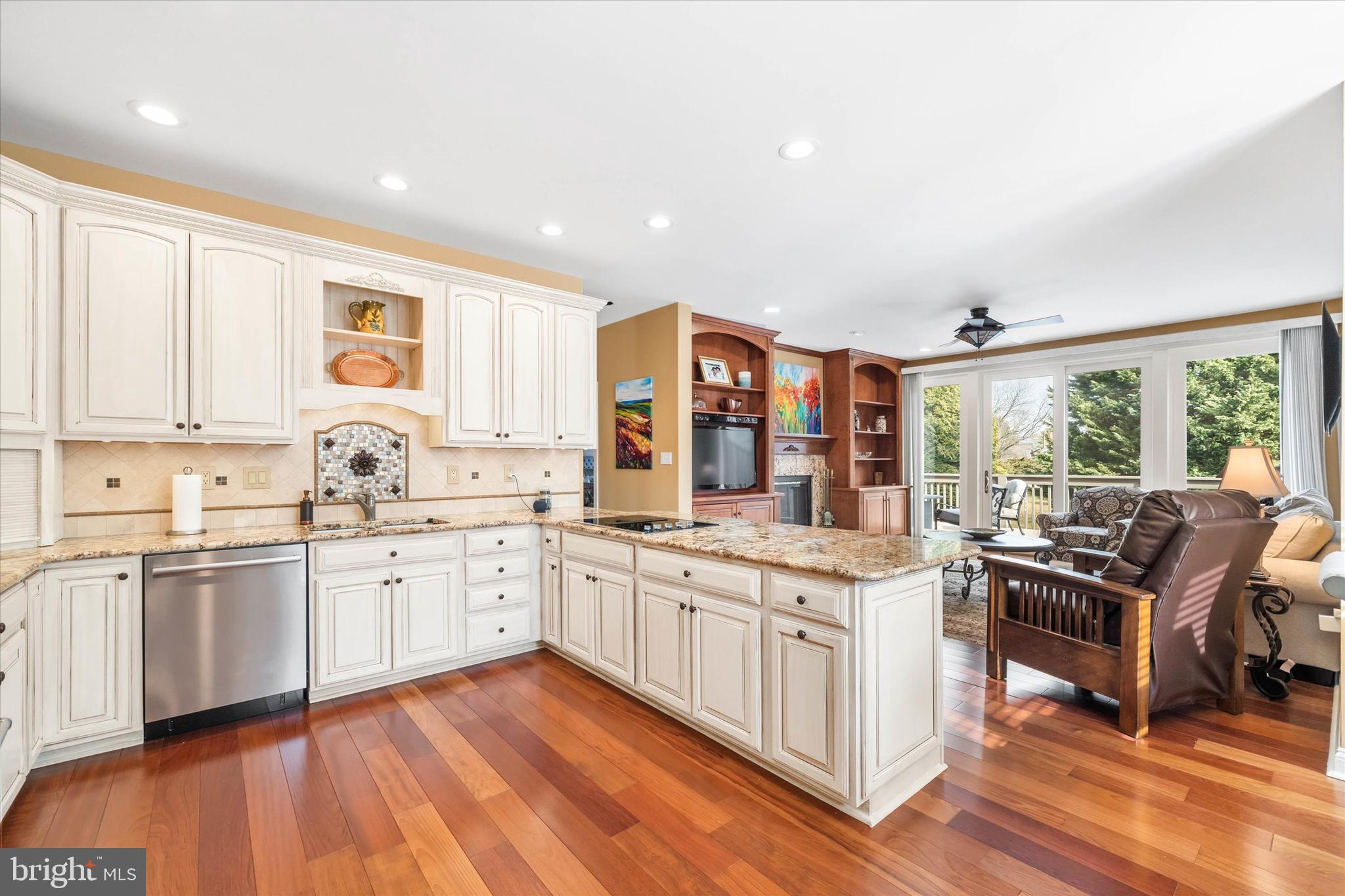 103 Downs Drive Wilmington, DE 19807 - Photo 21 of 70 a kitchen with stainless steel appliances granite countertop a stove and cabinets