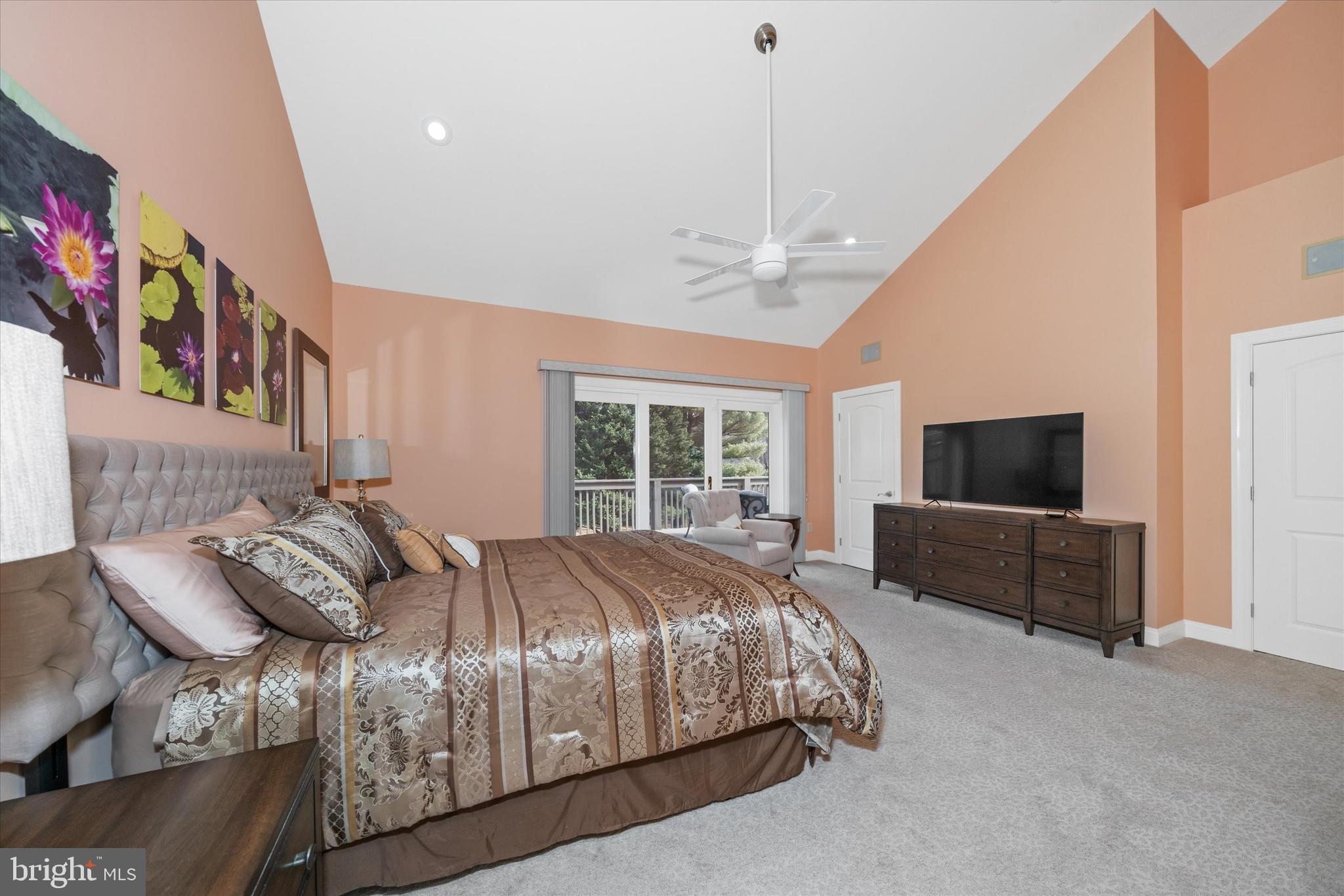 103 Downs Drive Wilmington, DE 19807 - Photo 28 of 70 a spacious bedroom with a bed and flat screen tv