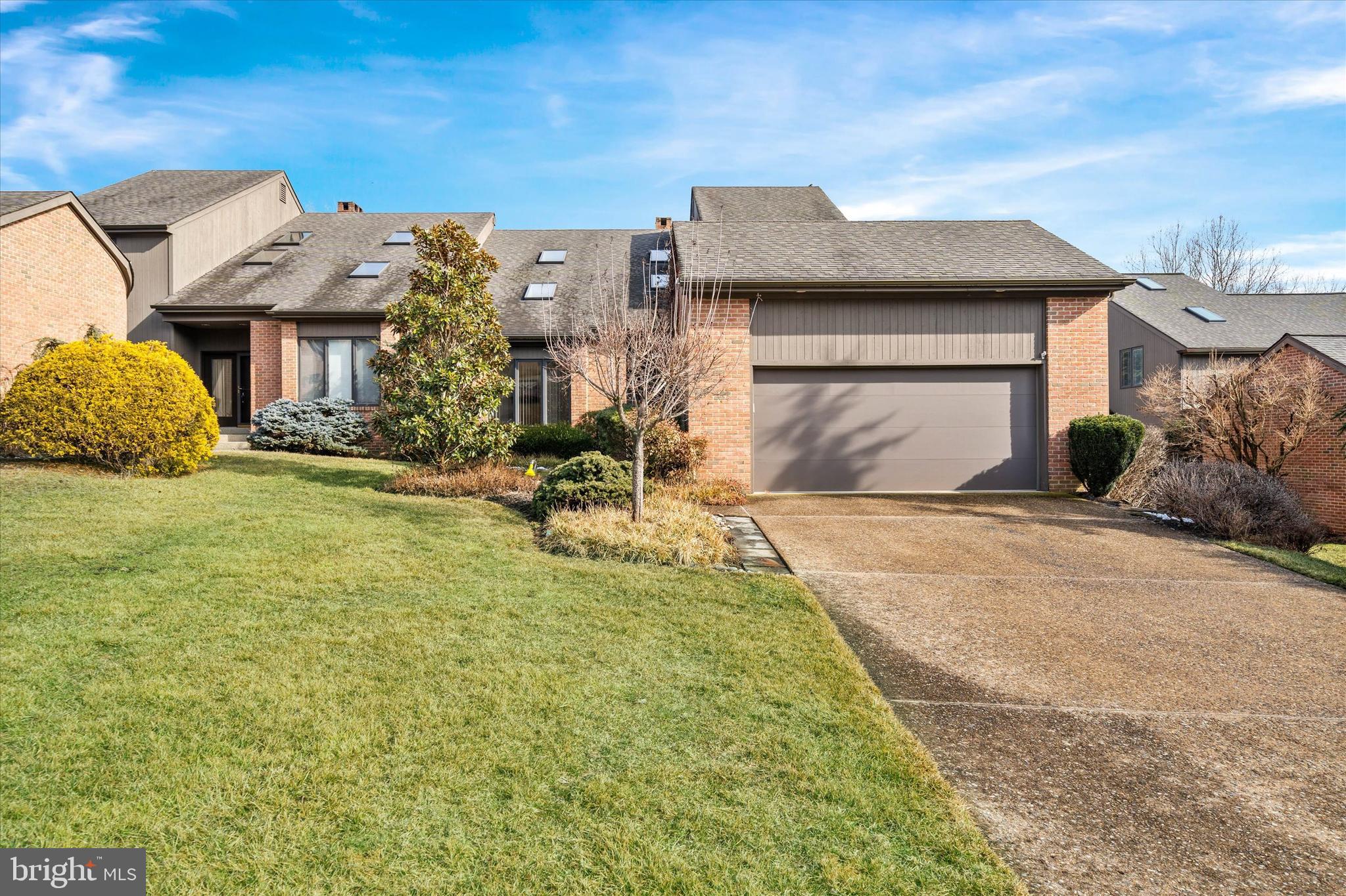 103 Downs Drive Wilmington, DE 19807 - Photo 3 of 70 a front view of a house with a yard