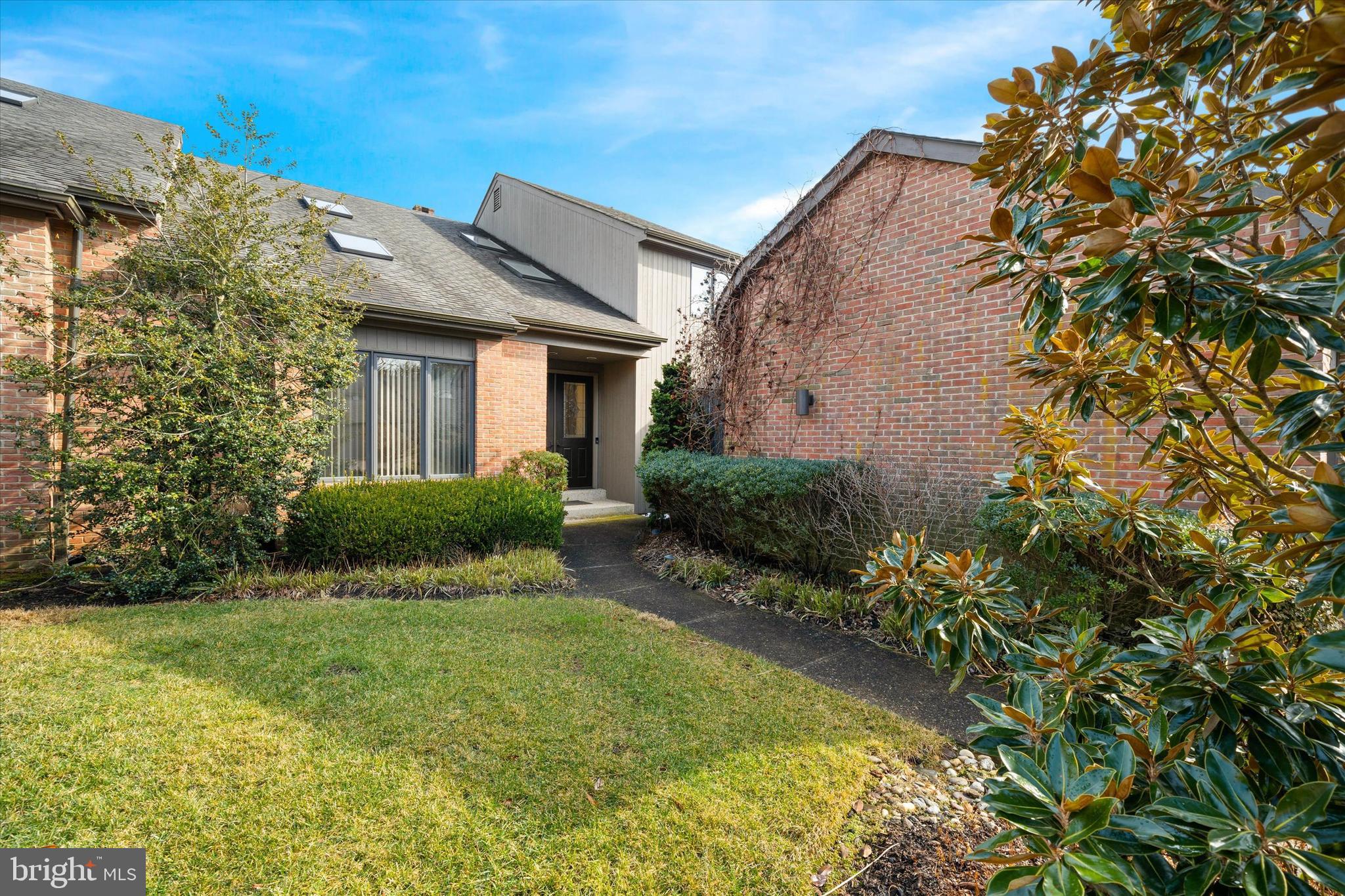103 Downs Drive Wilmington, DE 19807 - Photo 4 of 70 a view of a house with a garden