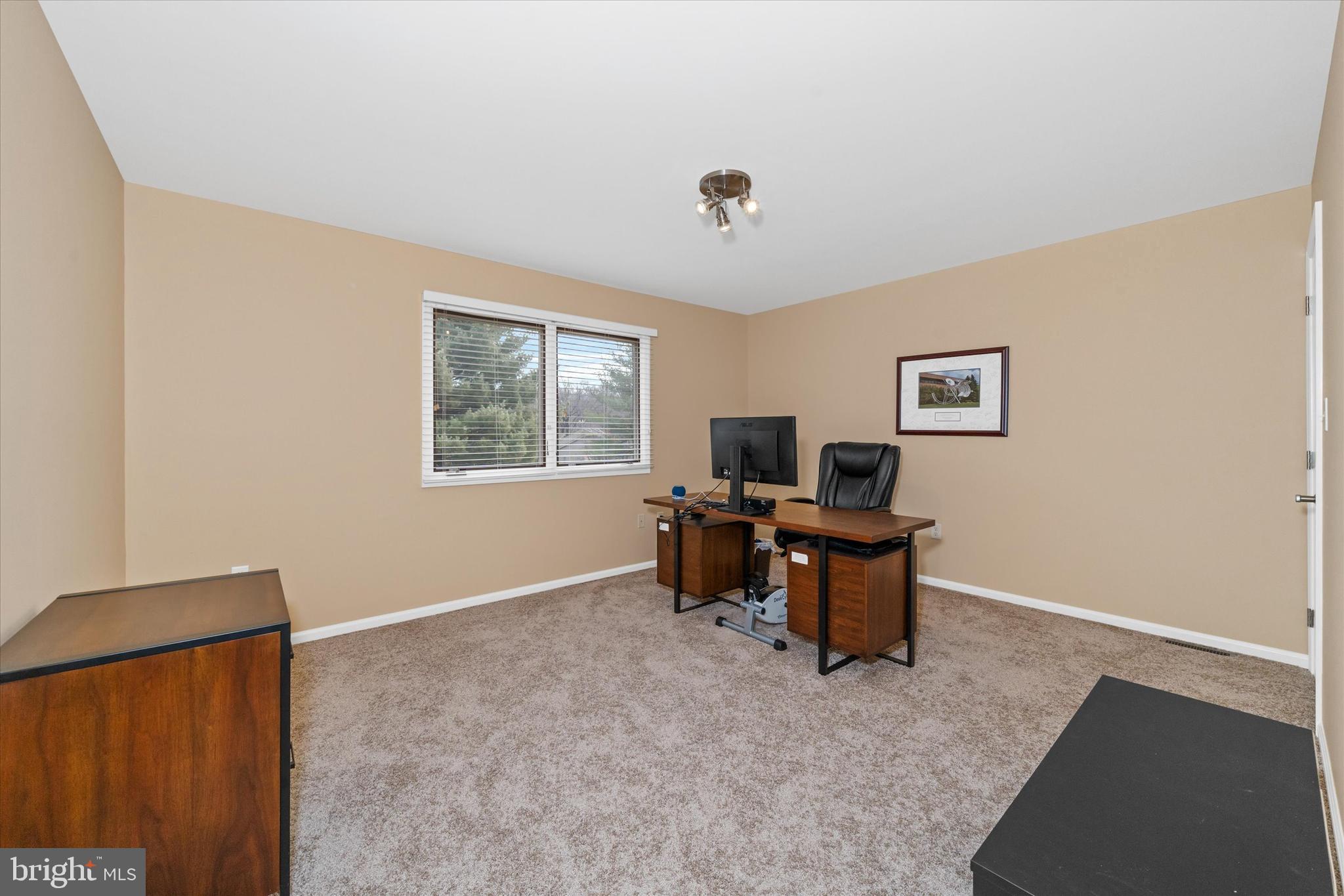 103 Downs Drive Wilmington, DE 19807 - Photo 41 of 70 a view of workspace with wooden floor windows