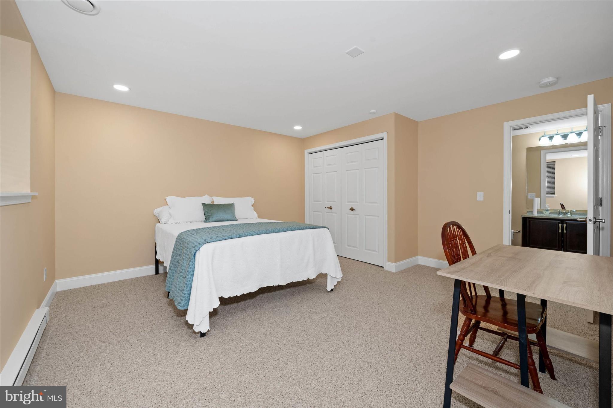 103 Downs Drive Wilmington, DE 19807 - Photo 53 of 70 a bedroom with a bed and a table