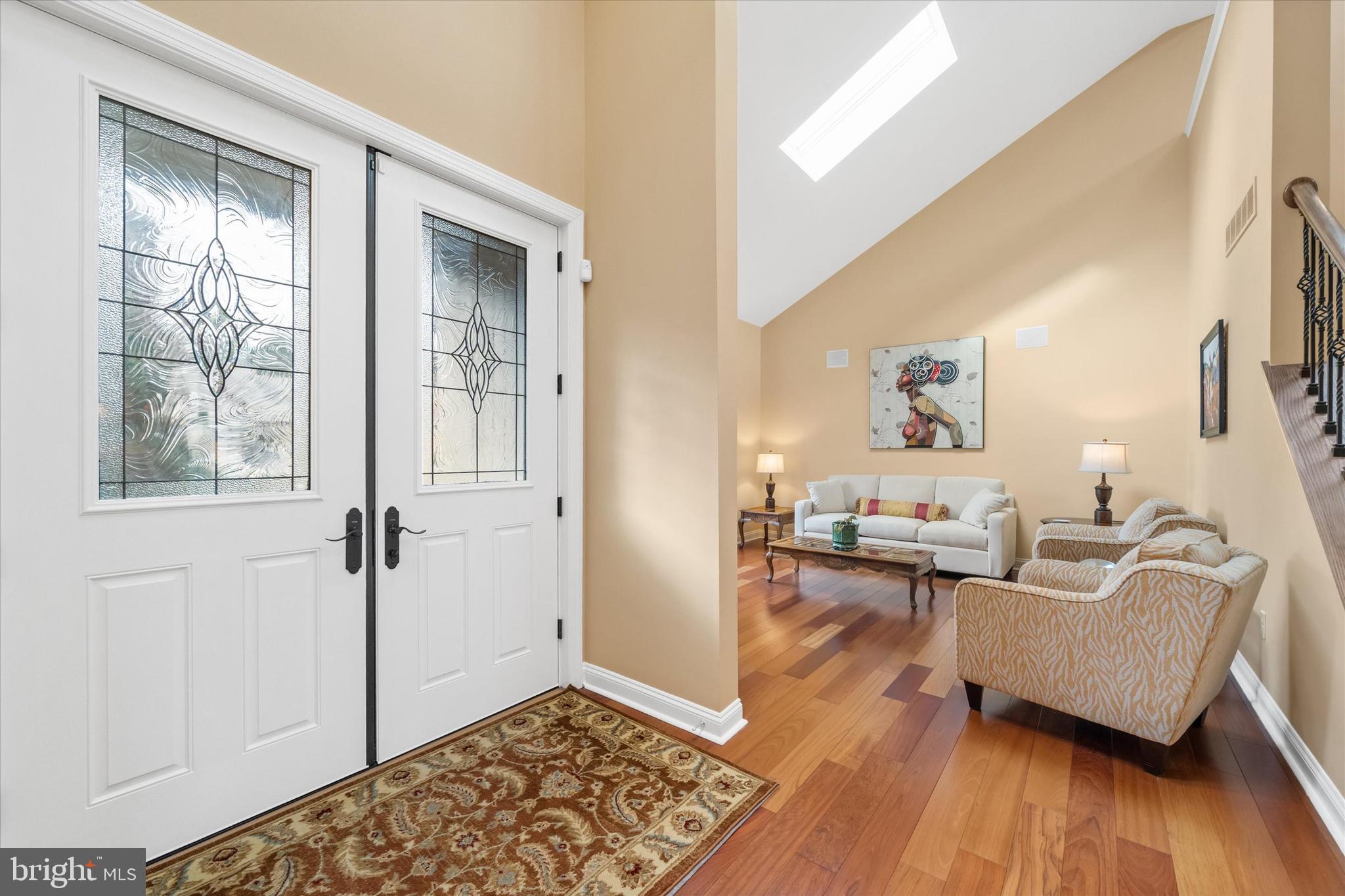103 Downs Drive Wilmington, DE 19807 - Photo 7 of 70 a living room with furniture and a wooden floor