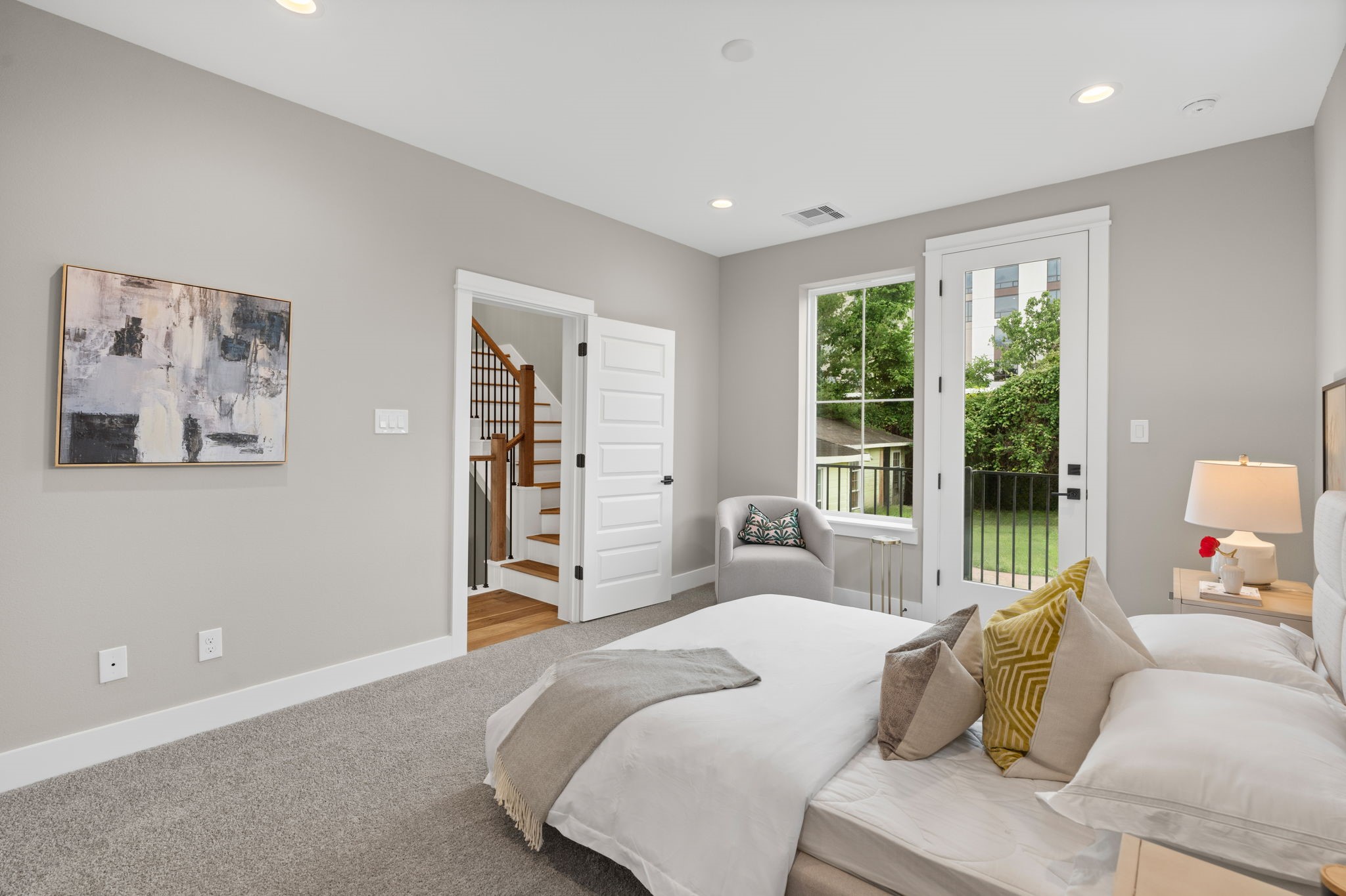 1177 West 19th Street Houston, TX 77008 - Photo 12 of 40 a bedroom with a bed and a large window