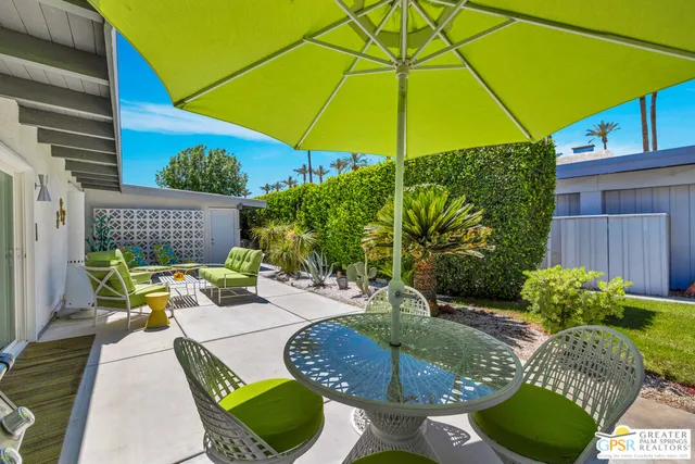 a building outdoor space with patio furniture