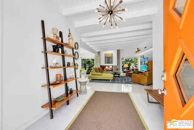 a view of a livingroom with furniture and a rug