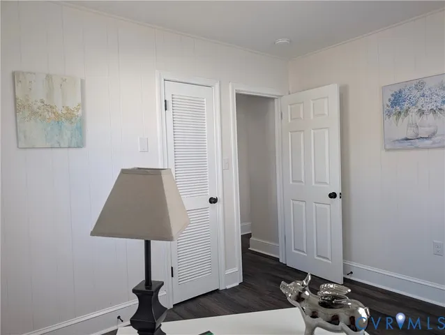 a room with furniture and a lamp