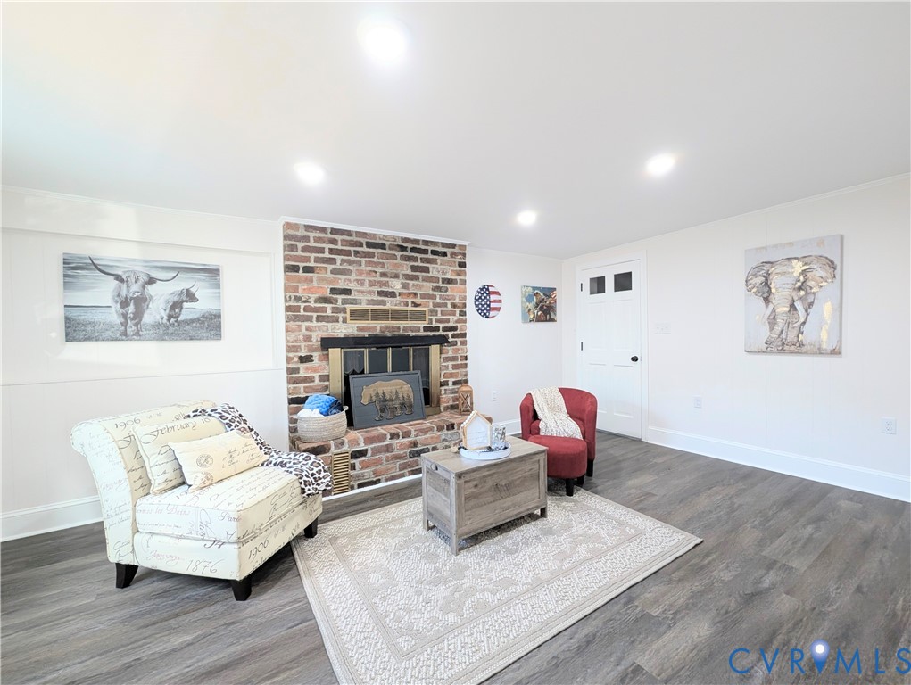 407 Washington Avenue Colonial Heights, VA 23834 - Photo 22 of 41 Living room with dark wood finished floors, a fire