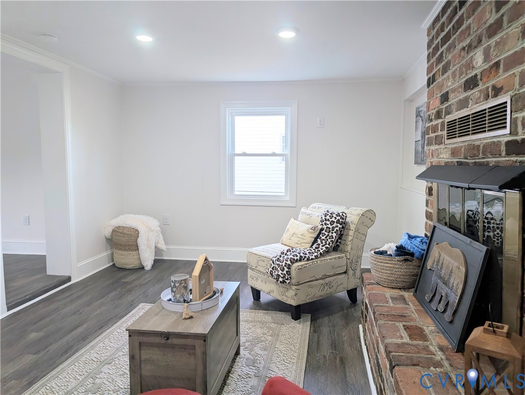 407 Washington Avenue Colonial Heights, VA 23834 - Photo 24 of 41 Living area with ornamental molding, wood finished