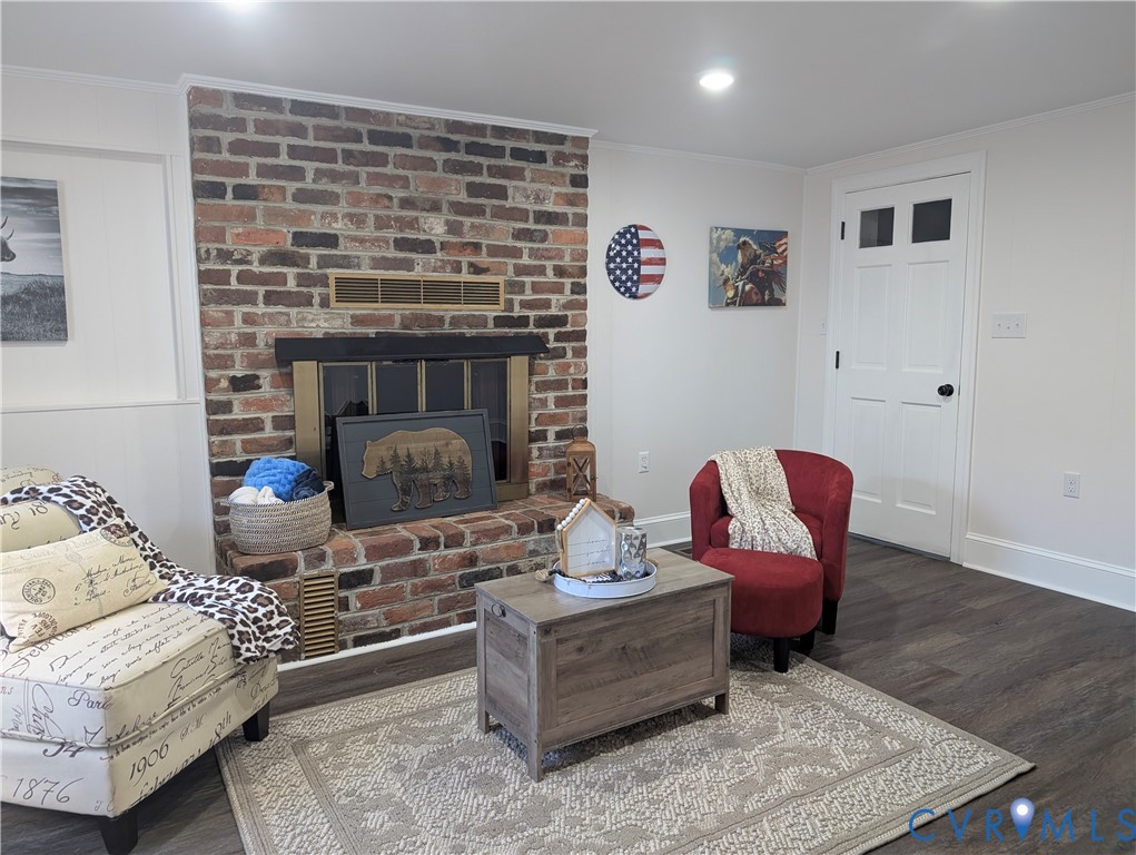 407 Washington Avenue Colonial Heights, VA 23834 - Photo 25 of 41 Living area featuring ornamental molding, wood fin