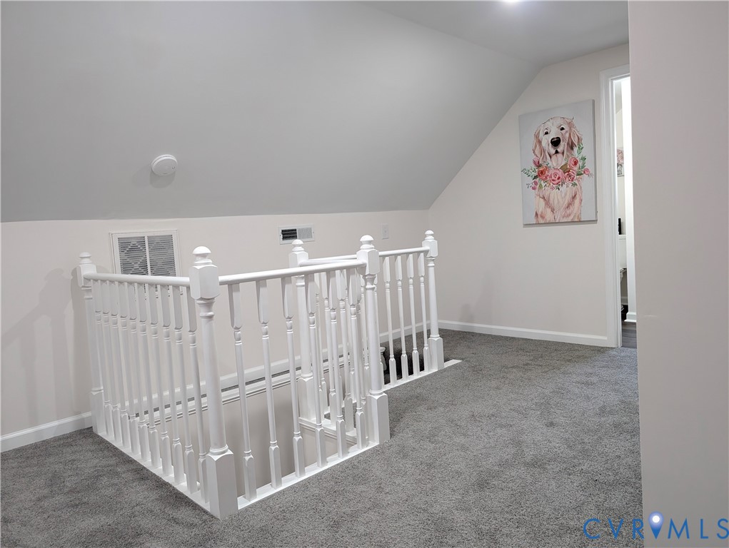 407 Washington Avenue Colonial Heights, VA 23834 - Photo 26 of 41 Bonus room with lofted ceiling and carpet floors